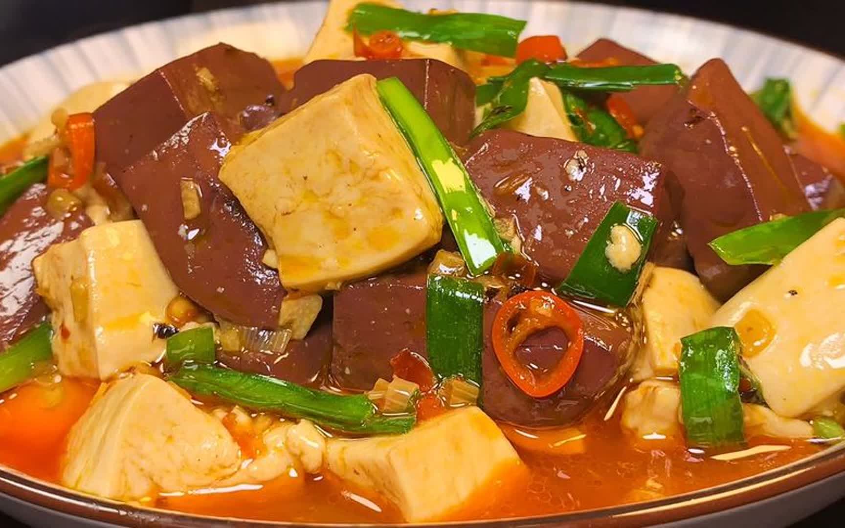 九阴真经猪血九阴真经猪血，江湖秘闻与独特风味-第2张图片